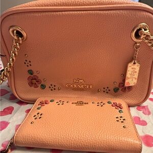 Coach Orange Crossbody Bag with Floral Embellishments